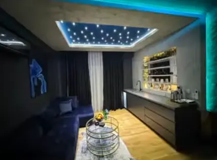 Exclusive luxury apartment with a private yard – A rare offer on the market, in Hrom